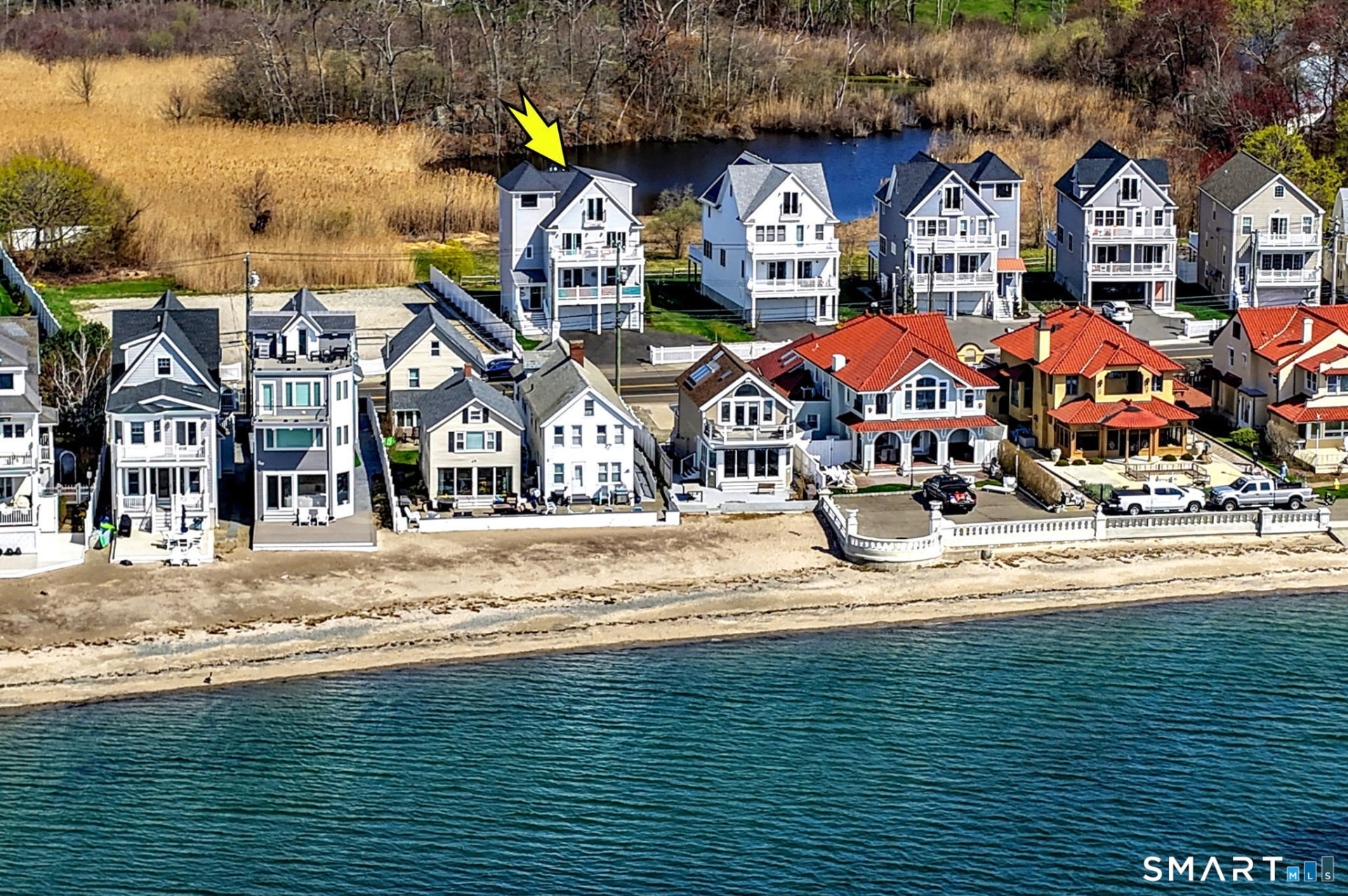 Aerial: beachfront setting