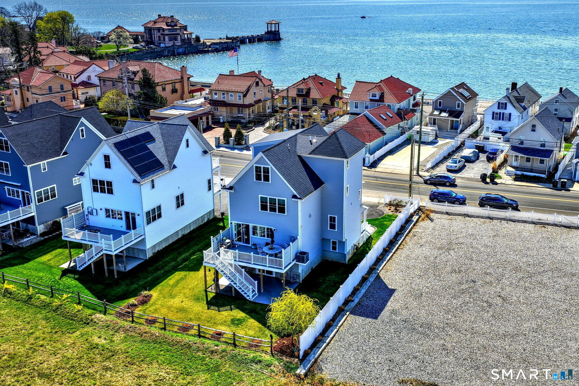 Aerial: rear decks and open yard